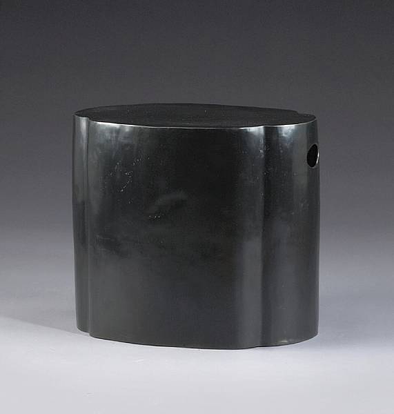 Appraisal: A Barbara Barry patinated bronze 'Oval Stump' side table McGuire