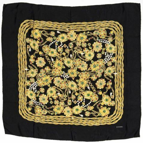 Appraisal: Chanel printed silk scarf jewels hand rolled edges black ground