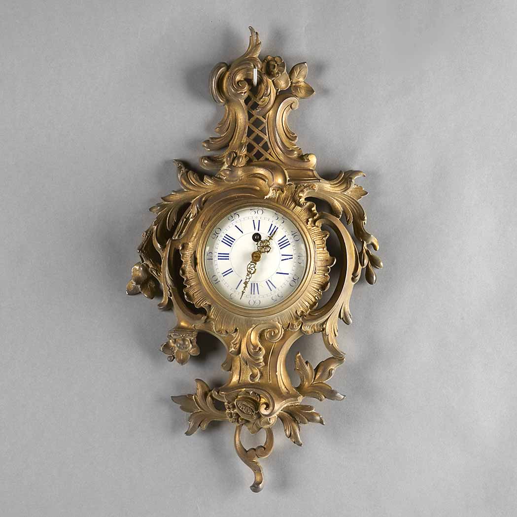 Appraisal: Louis XV Style Gilt-Bronze Cartel Clock The circular enamel dial