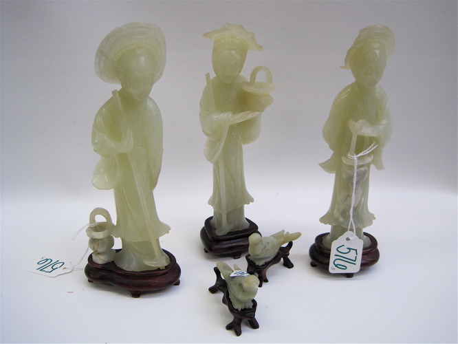 Appraisal: FIVE CHINESE SERPENTINE CARVED FIGURES three of standing people in