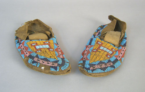 Appraisal: Pair of Plains Indian beaded moccasins early th c l