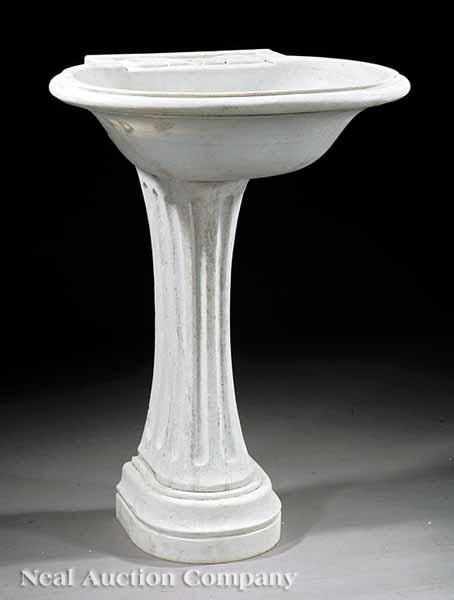 Appraisal: A Carved Carrara Marble Basin on fluted stem stepped base