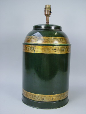 Appraisal: A tole tea canister type lamp base decorated in green