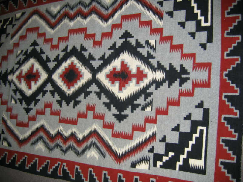 Appraisal: NAVAJO FLATWEAVE RUG A Begay interpretation of the storm pattern