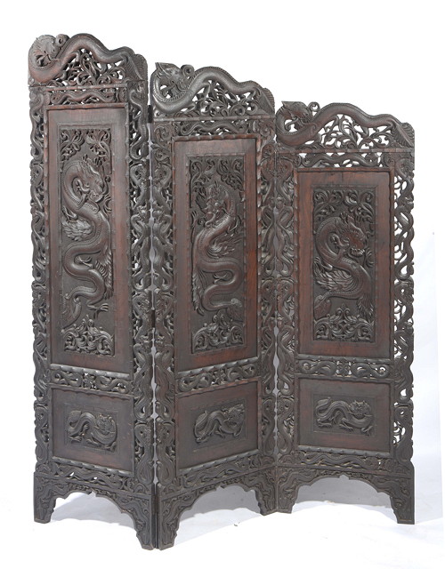 Appraisal: A CHINESE HARDWOOD SCREEN of triple folding form with panels