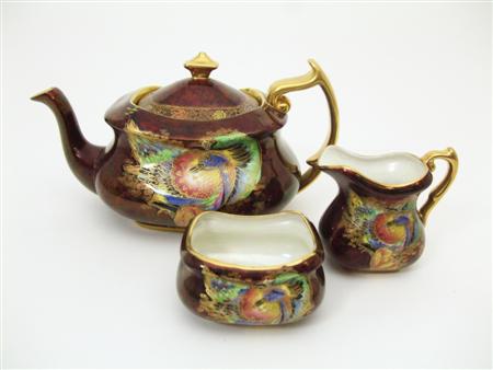 Appraisal: CARLTON WARE 'CRESTED BIRD AND WATERLILY' PART TEA SERVICE comprising