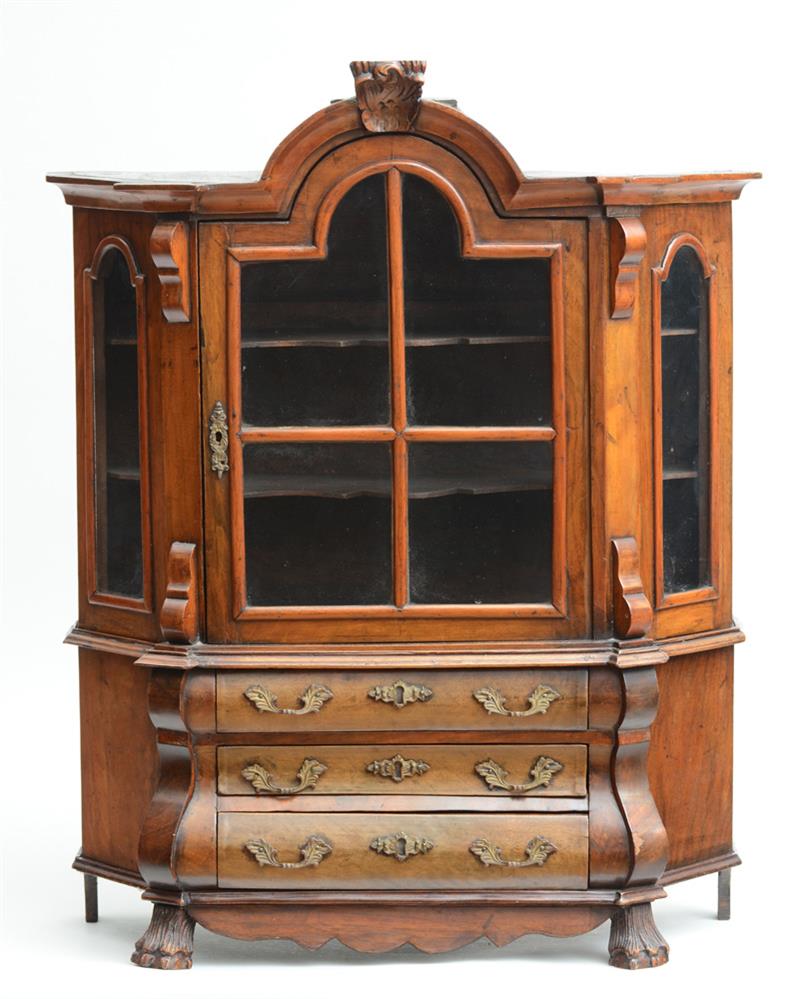 Appraisal: DUTCH ROCOCO STYLE WALNUT MINIATURE DISPLAY CUPBOARD The break arch