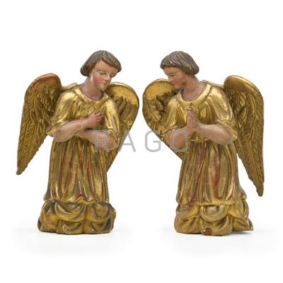 Appraisal: PAIR OF ITALIAN CARVED WOOD ANGELS Gilded decoration th c