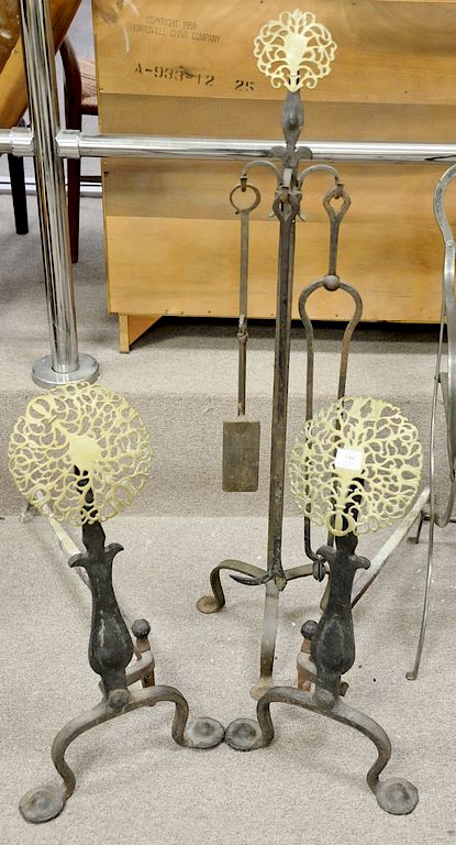 Appraisal: Andirons and tools brass and iron andiron ht in Andirons