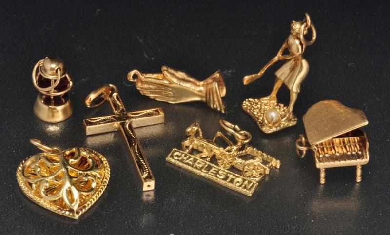 Appraisal: Lot of K Y Gold Charms Description Includes grand piano