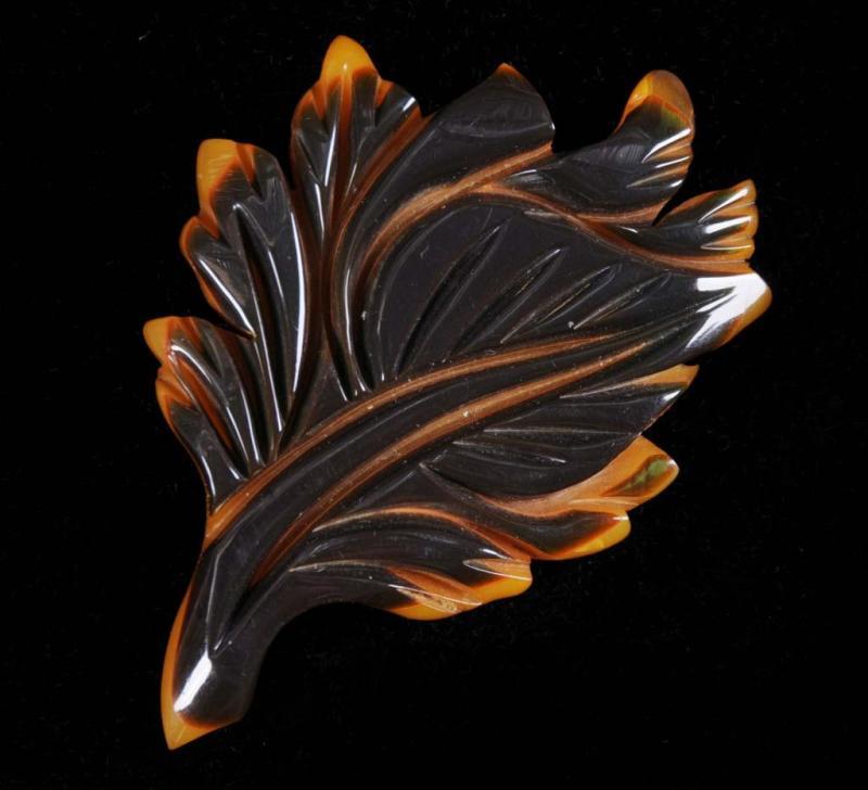 Appraisal: Bakelite Laminated Yellow Black Leaf Pin Condition Excellent Size -