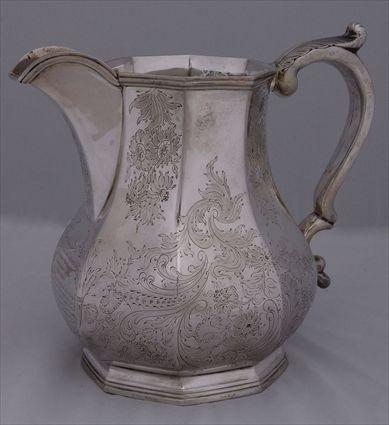 Appraisal: GALE HAYDEN PRESENTATION SILVER FOOTED WATER PITCHER Of octagonal pear