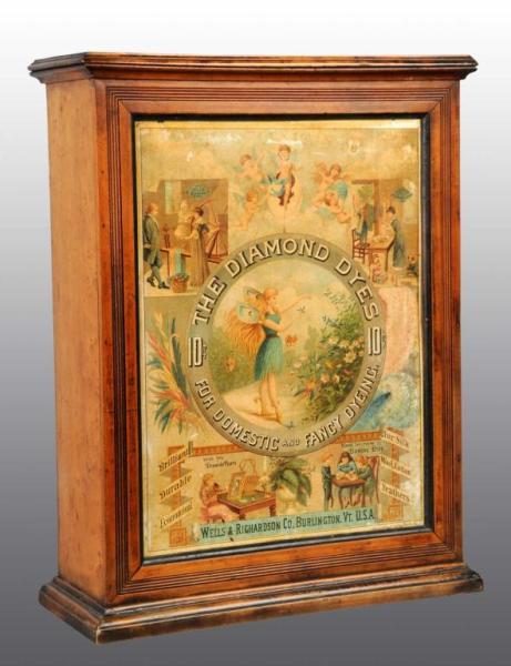 Appraisal: Diamond Dye Cabinet with Fairy Description Early cabinet with with