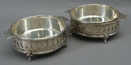 Appraisal: A pair of sterling silver coasters with attachable liners by