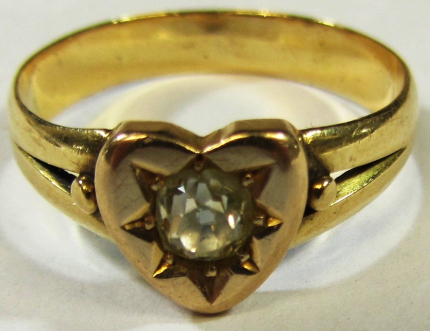 Appraisal: A gold and diamond set single stone ring mounted with