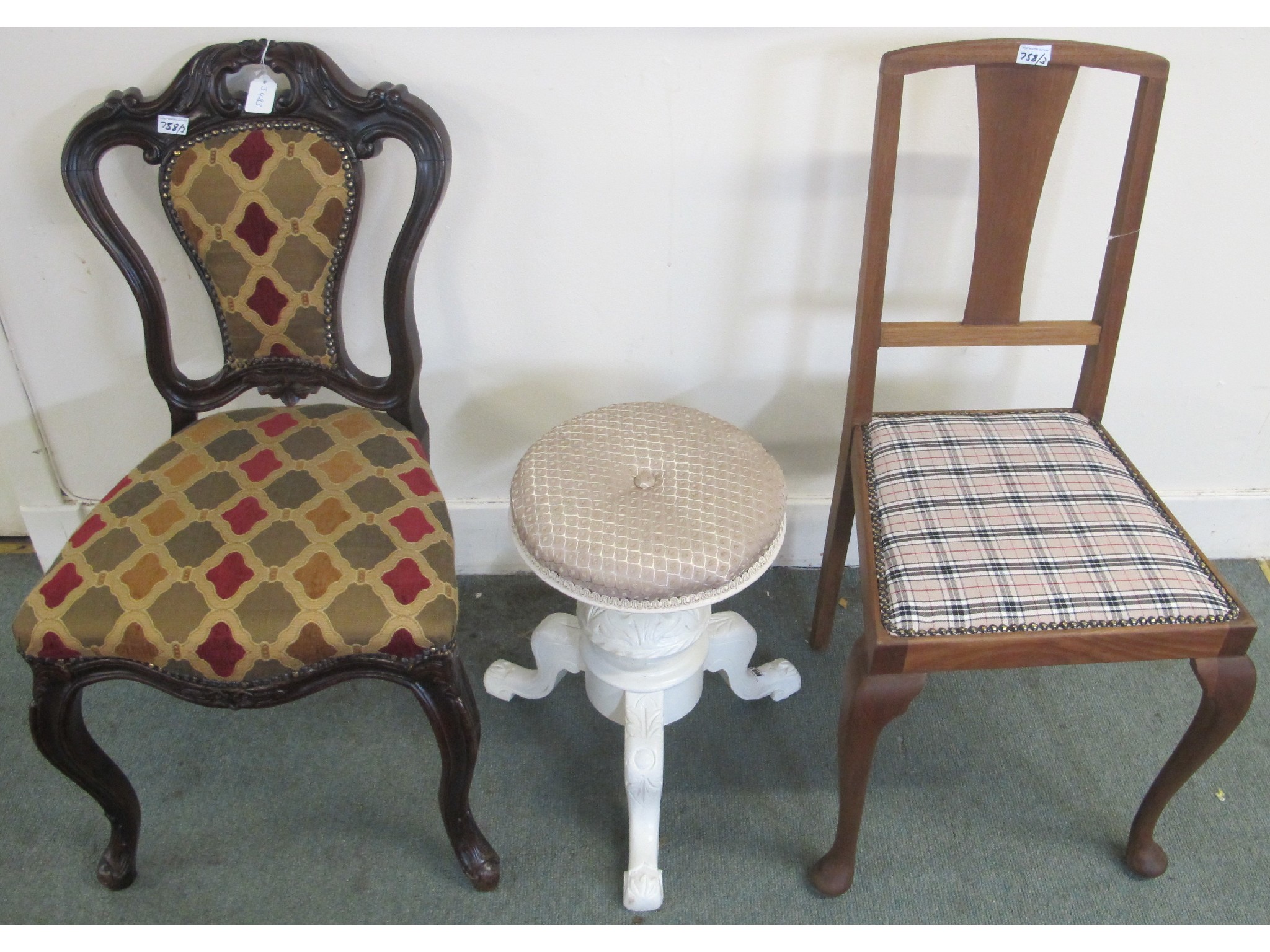 Appraisal: A reproduction chair white upholstered piano stool and a hardwood