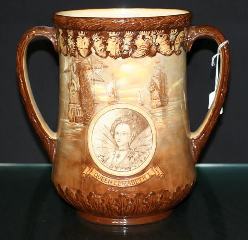 Appraisal: A Royal Doulton Loving cup by Cecil J Noke and