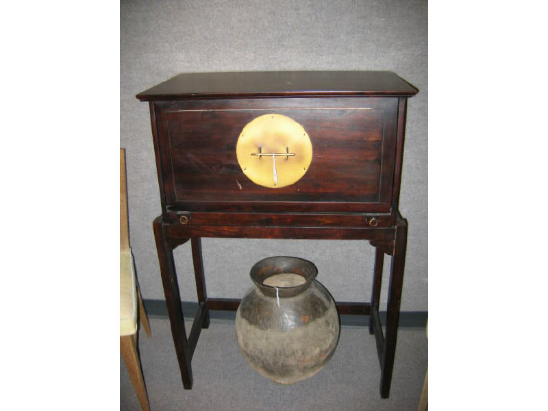 Appraisal: MODERNIST CHINESE INSPIRED DESK with fall-front having brass moon-form hardware