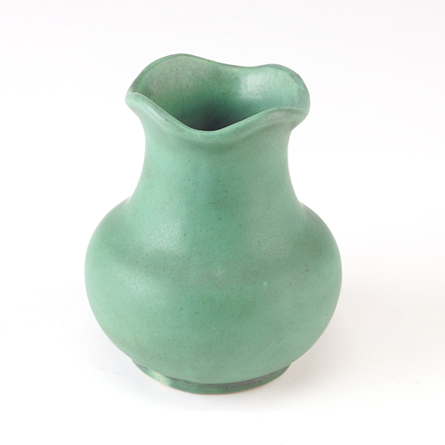 Appraisal: TECO Bulbous vase with scalloped rim covered in matte green