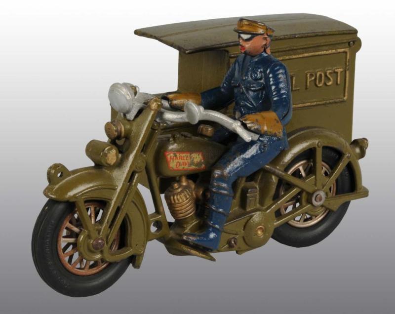 Appraisal: Cast Iron Parcel Post Motorcycle Toy Description All original with