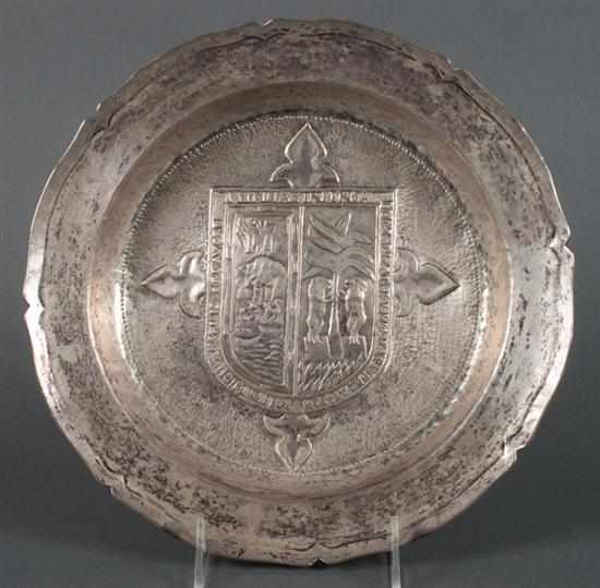 Appraisal: Continental armorial repousse decorated pewter shallow basin th century in