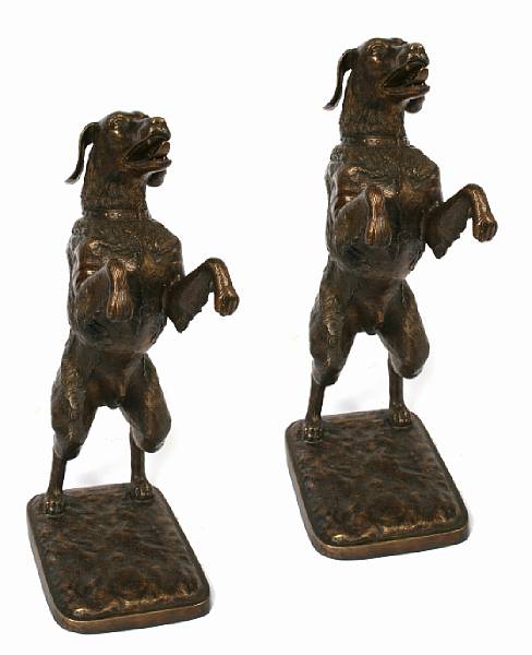 Appraisal: A pair of patinated bronze dancing dogs height in width