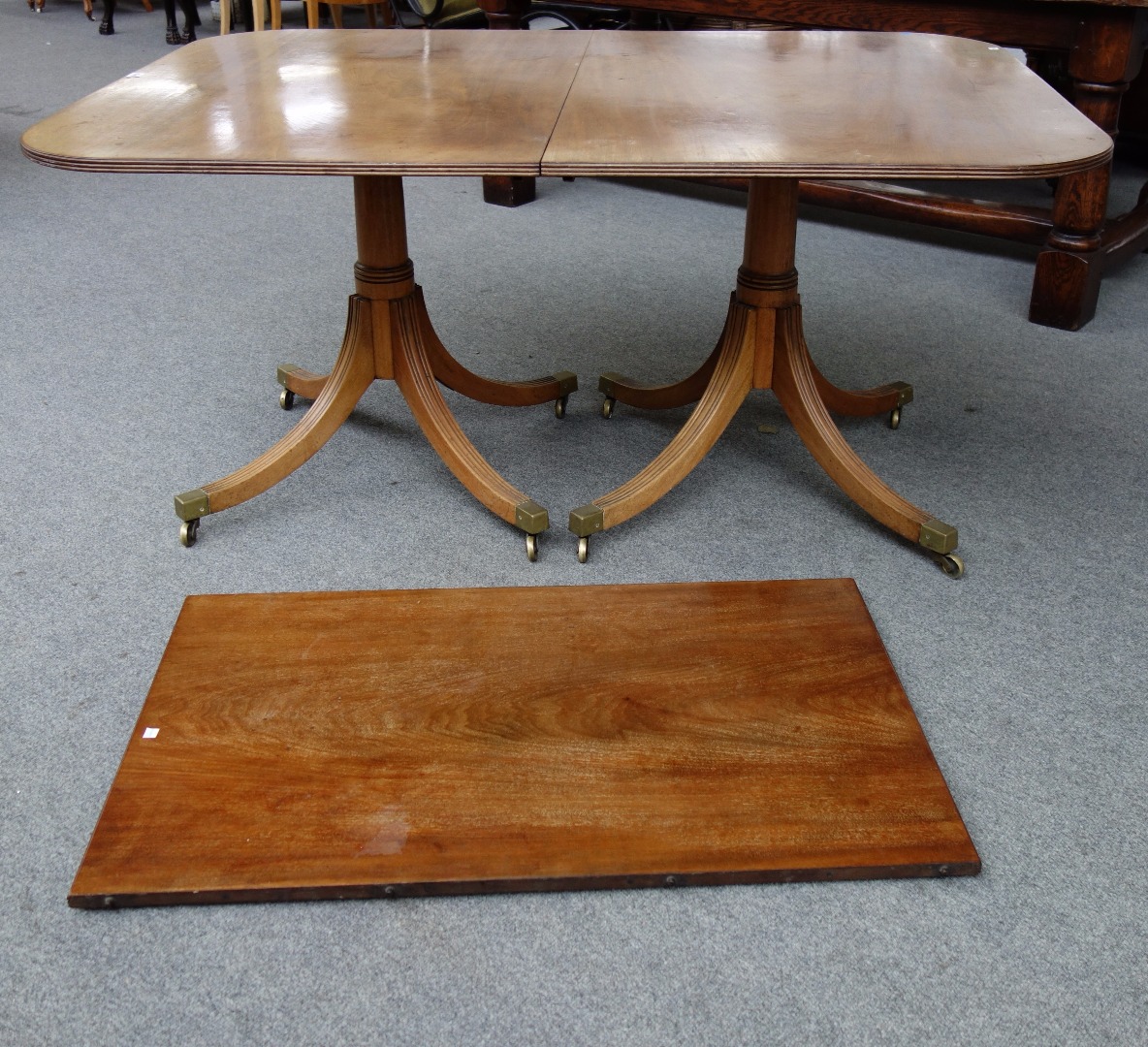 Appraisal: A George III style mahogany 'D' end extending dining table