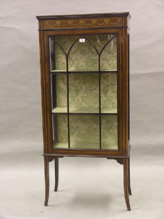 Appraisal: An Edwardian inlaid mahogany display cabinet the frieze with painted