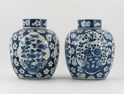 Appraisal: A large pair of Chinese blue and white prunus vases