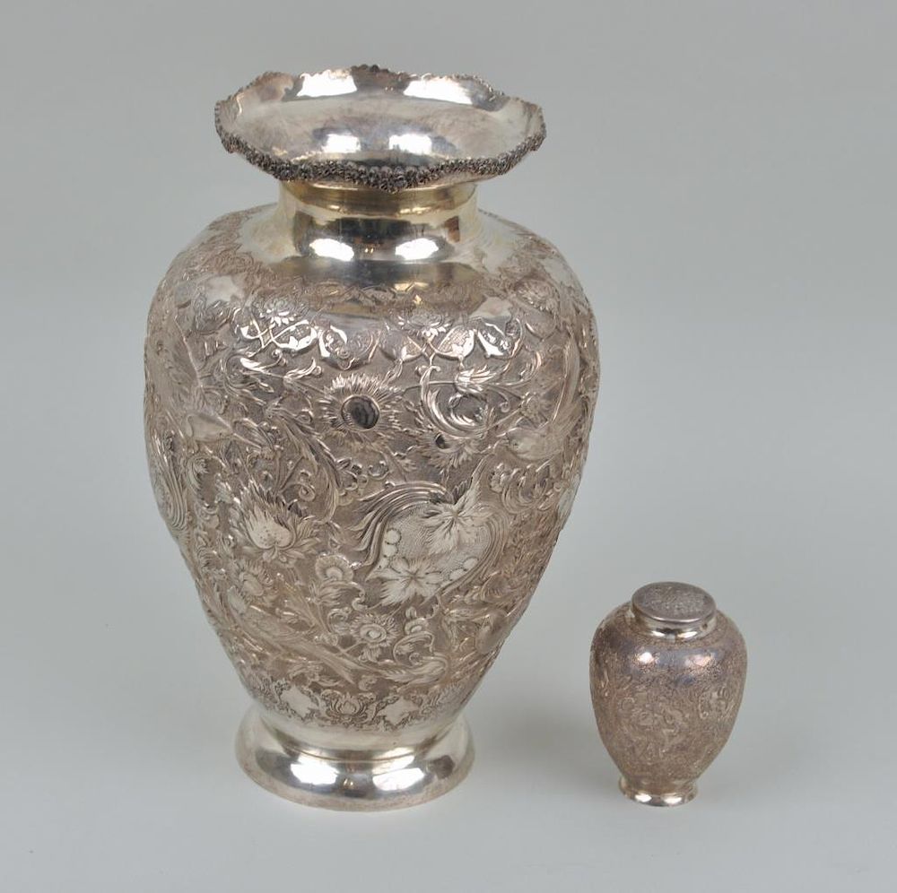 Appraisal: Two Persian Engraved Silver Items comprising a large vase with