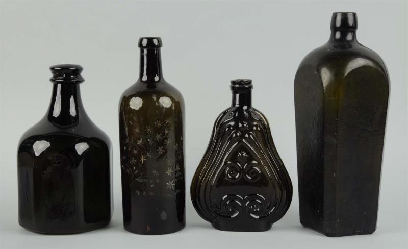 Appraisal: Lot of Dark Olive Green Bottles Includes a painted bottle