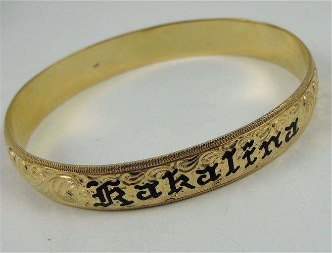 Appraisal: FOURTEEN KARAT YELLOW GOLD BANGLE weighing grams