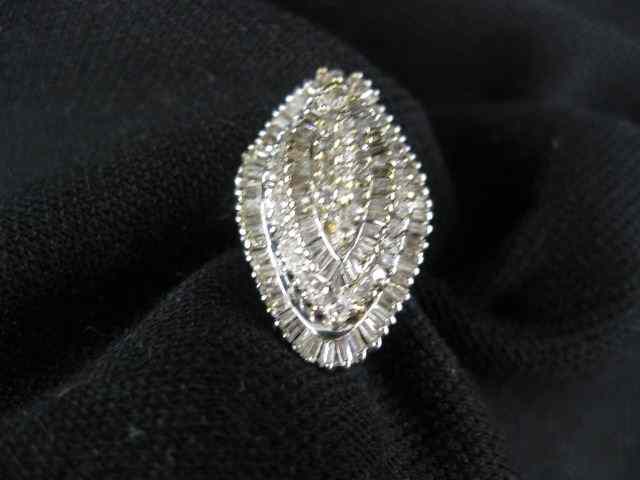 Appraisal: Diamond Ring round baguettediamonds totaling carats in k white yellow