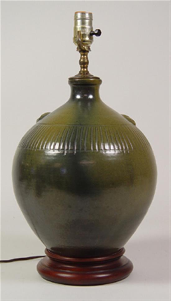 Appraisal: Ben Owen Lamp On wooden base Green frog-skin glaze jug