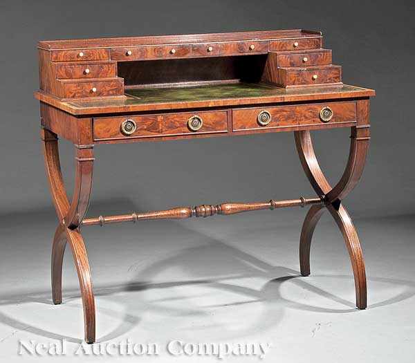 Appraisal: A Regency-Style Figured Mahogany Writing Desk stepped superstructure of eight