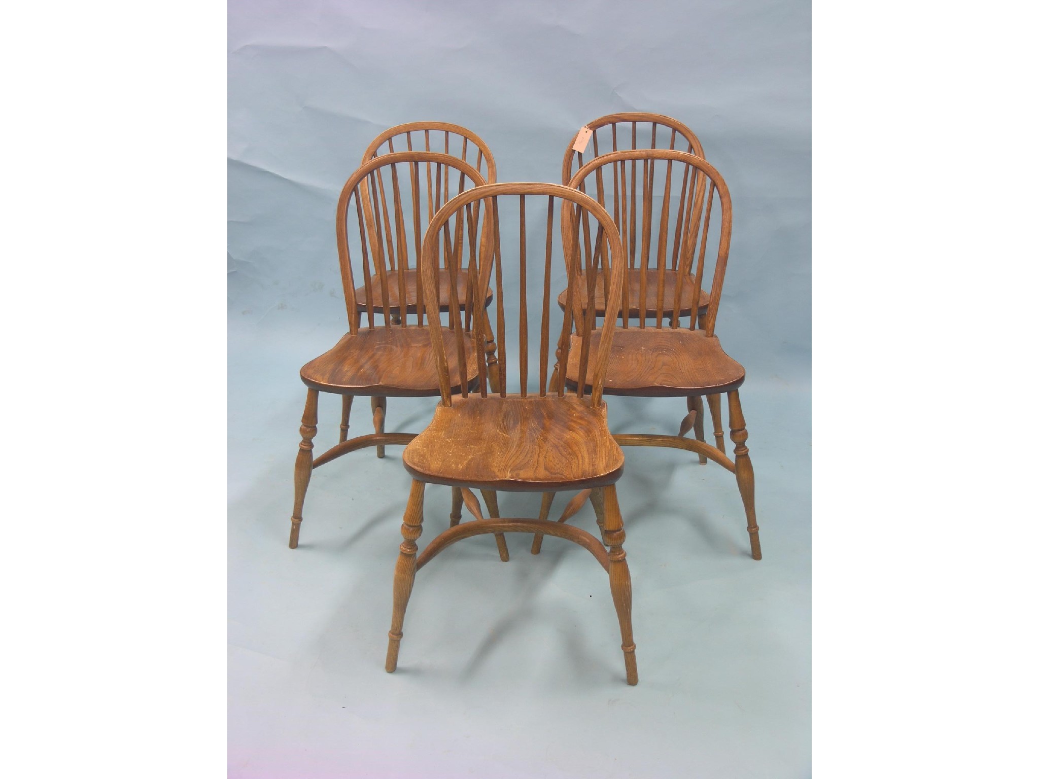 Appraisal: A set of five Windsor stick-back kitchen chairs ash with