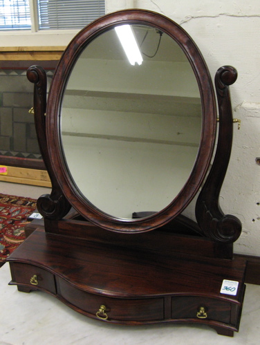 Appraisal: FEDERAL STYLE MAHOGANY DRESSING TABLE MIRROR the oval mirror tilting