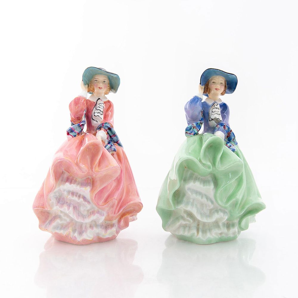 Appraisal: PAIR OF ROYAL DOULTON CERAMIC FIGURINES Top o the Hill