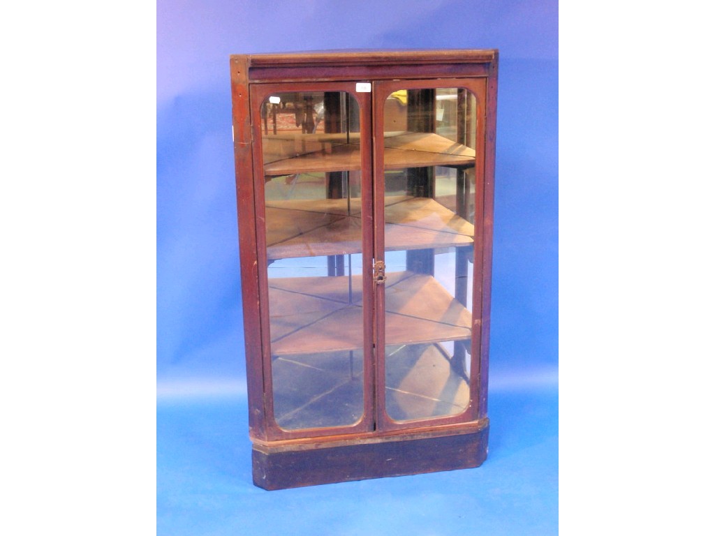 Appraisal: A Victorian mahogany corner cupboard with mirror back and later