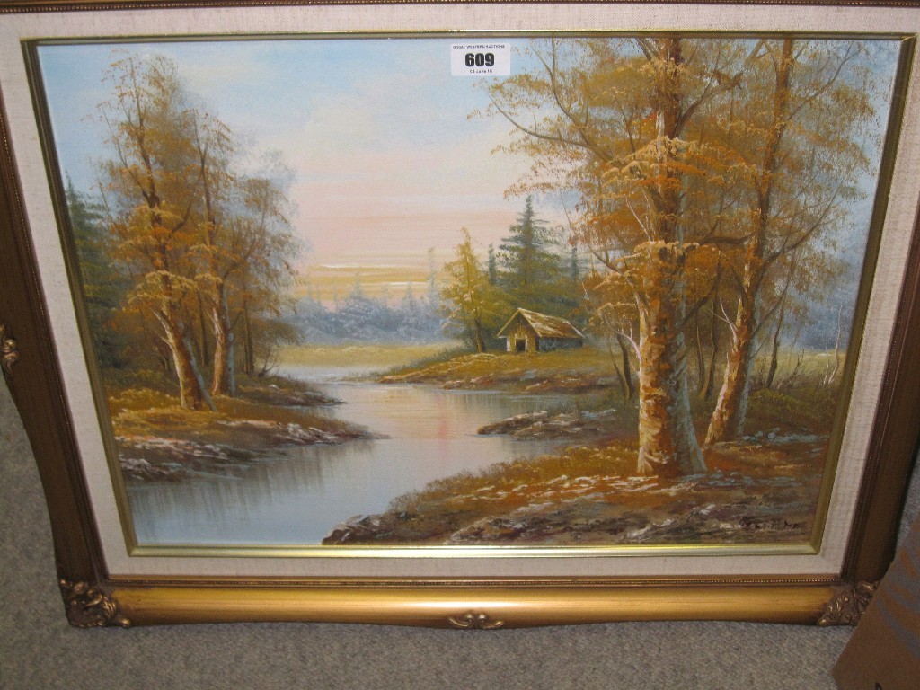 Appraisal: A framed oil on canvas depicting a river scene