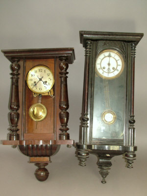 Appraisal: A Continental wooden cased regulator type wall clock the case