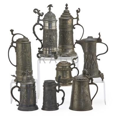 Appraisal: CONTINENTAL PEWTER LIDDED TANKARDS Eight with relief decoration liter to