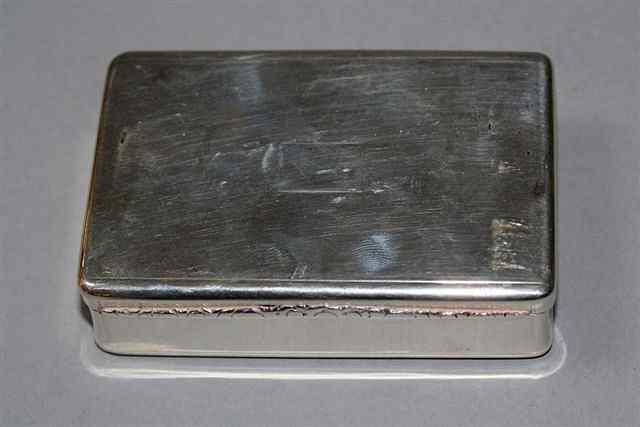 Appraisal: A VICTORIAN SILVER SNUFF BOX rectangular with hinged lid London