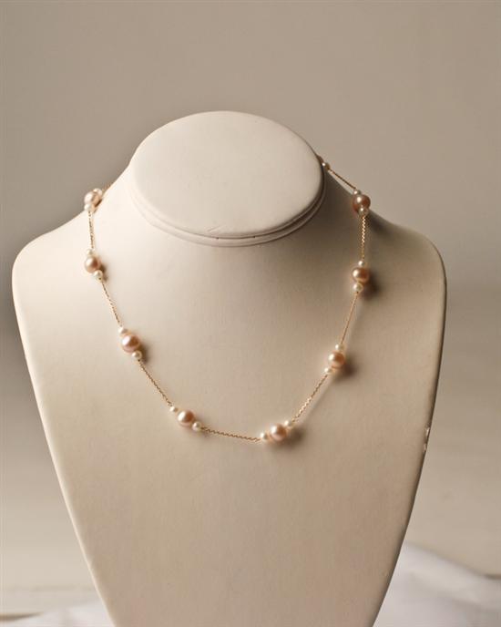 Appraisal: Necklace with Peach Colored and White Freshwater Pearls long