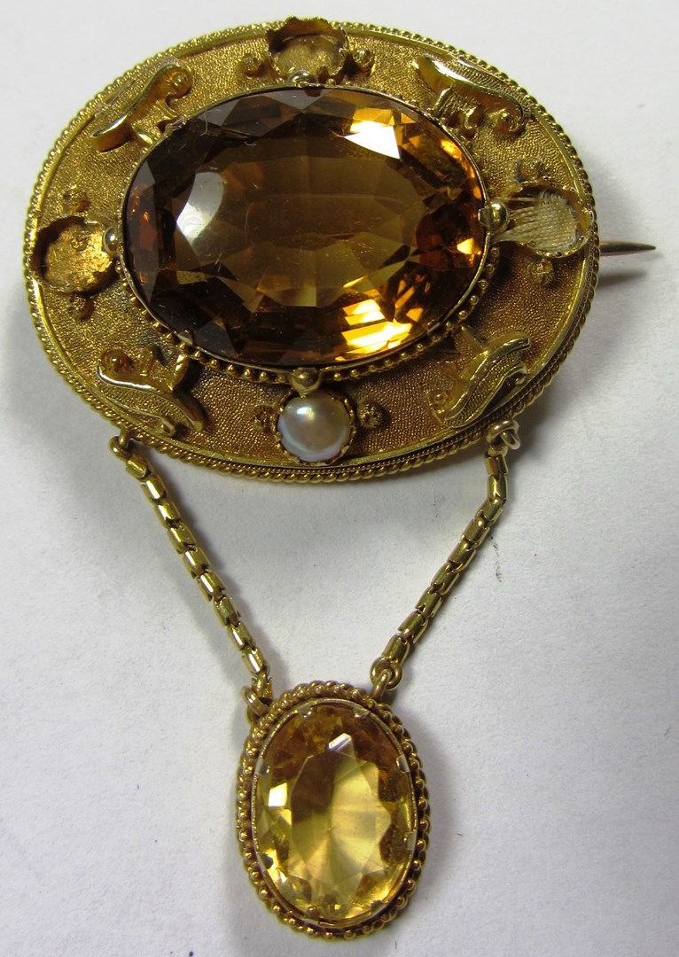 Appraisal: A Victorian gold citrine and half pearl set oval brooch