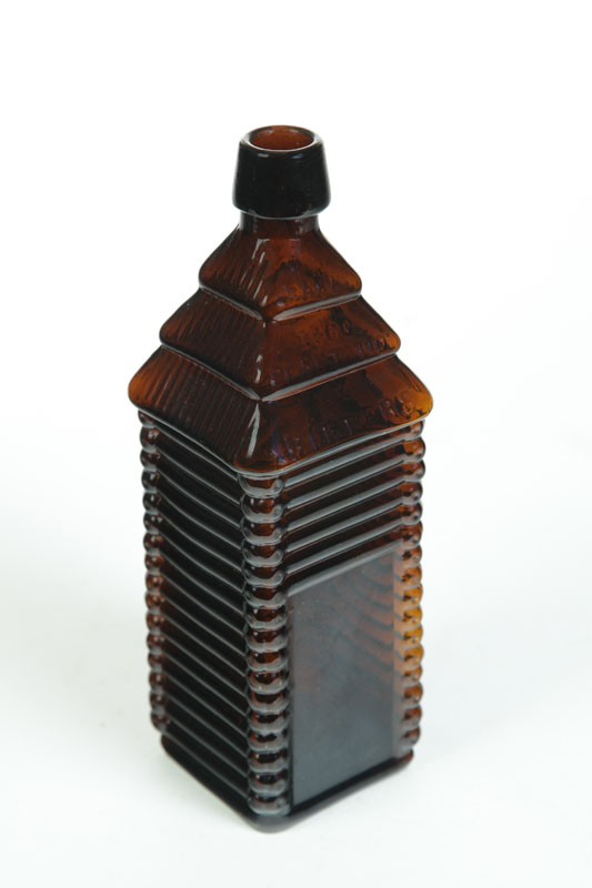 Appraisal: BITTERS BOTTLE American nd half- th century Amber log cabin