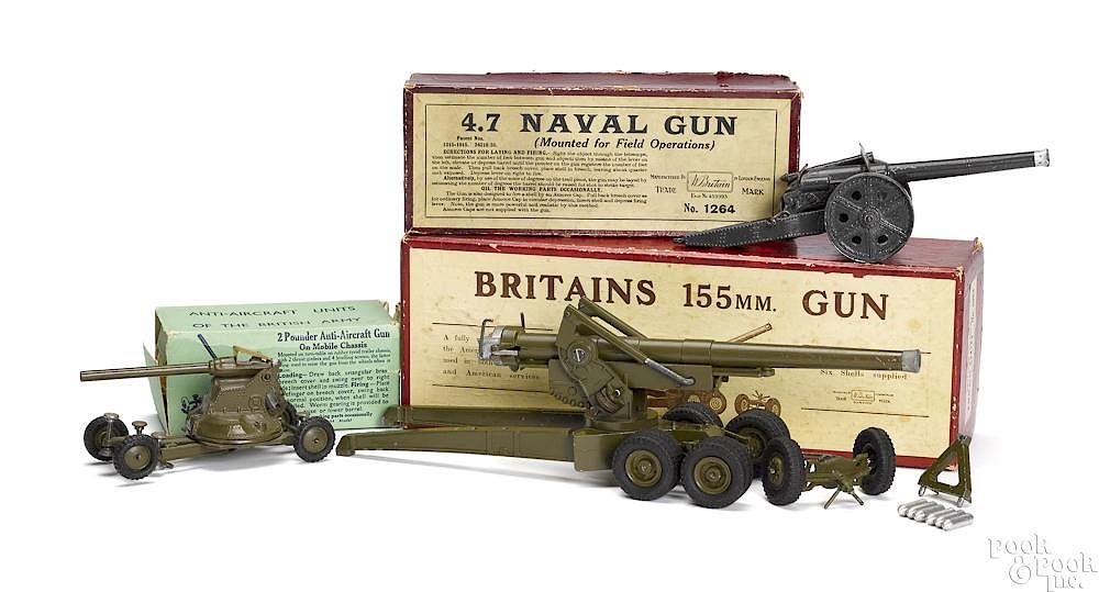 Appraisal: Three Britain's iron and steel guns Three Britains iron and