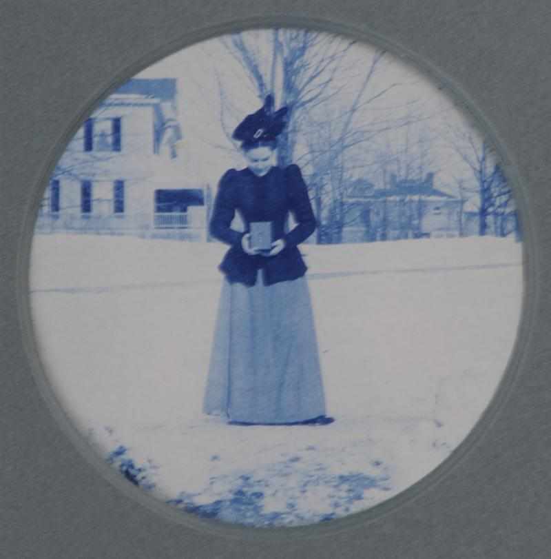 Appraisal: UNKNOWN C WOMAN HOLDING A BOX CAMERA Cyanotype print Provenance