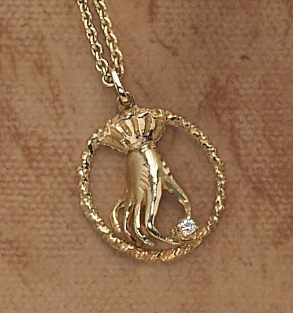 Appraisal: GOLD AND DIAMOND PENDANT NECKLACE k yellow gold round pendant