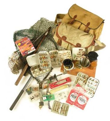 Appraisal: A quantity of fishing tackle and accessories including two canvas